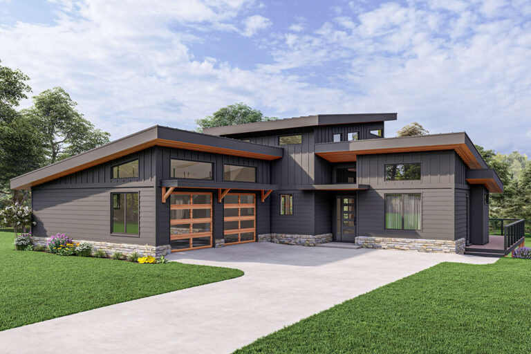 The Phases of Custom Home Design: A modern custom-built home showcasing sleek architecture, natural materials, and expansive windows.