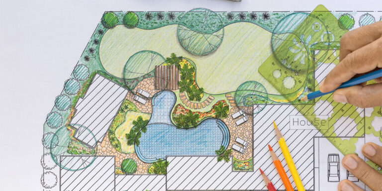 Hand drawing a detailed landscape architecture plan with a pool, greenery, and outdoor living spaces, illustrating The Role of Landscape Architecture.